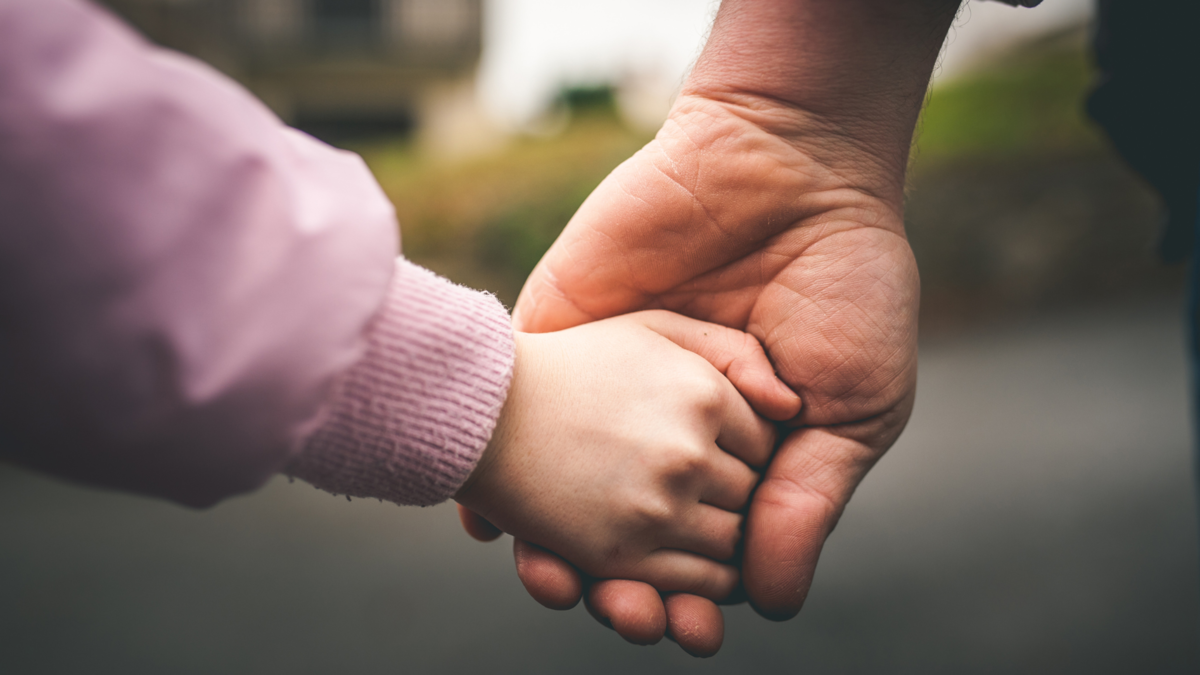 Father and Daughter Holding Hands
