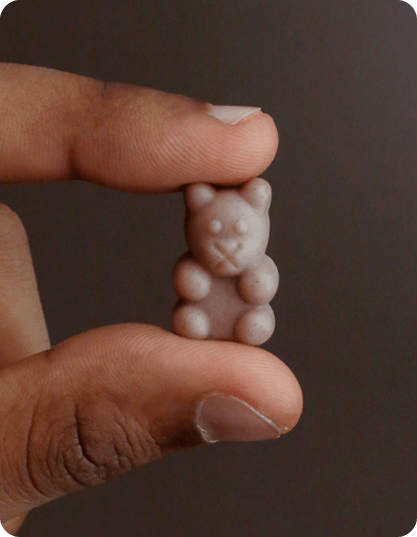 Hand holding gummy